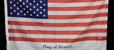 911 flag donated to OCM BOCES honors victims of attack